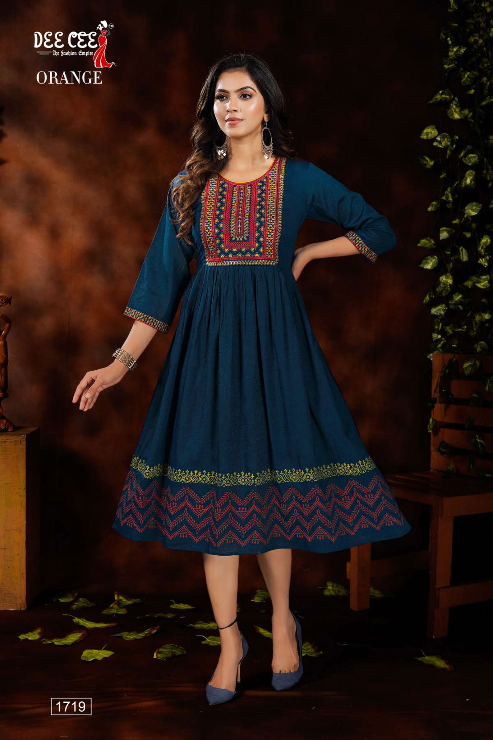Dee Cee Orange Rayon Fancy Wear Designer Latest Kurtis Collection